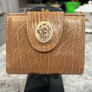 Vintage 1967 Rolf’s buffalo calf leather ladies wallet with floral decal.